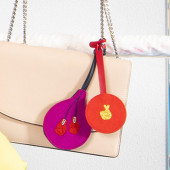 Embroidered keyring & hand-embroidered luggage tags